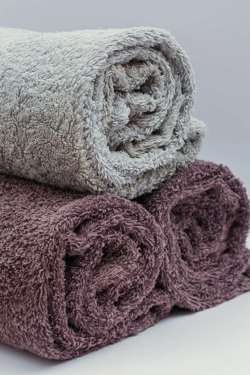 Rolled towels in a neat stack